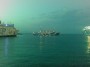 Navi e traghetti in Toscana - M/N Moby Giraglia in manovra nel porto di Piombino. Sulle fiancate si riconosce il disegno stilizzato di due ragazzi che fanno sci nautico trainati dalla grande balena blu, simbolo della compagnia. Sulla sinistra si scorge la M/N Moby Lally - Fotografia 26 maggio 2009